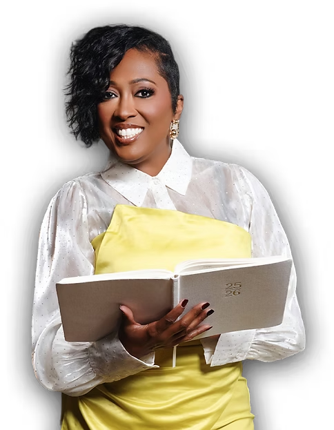 Dr. Mia Young holding an open planner